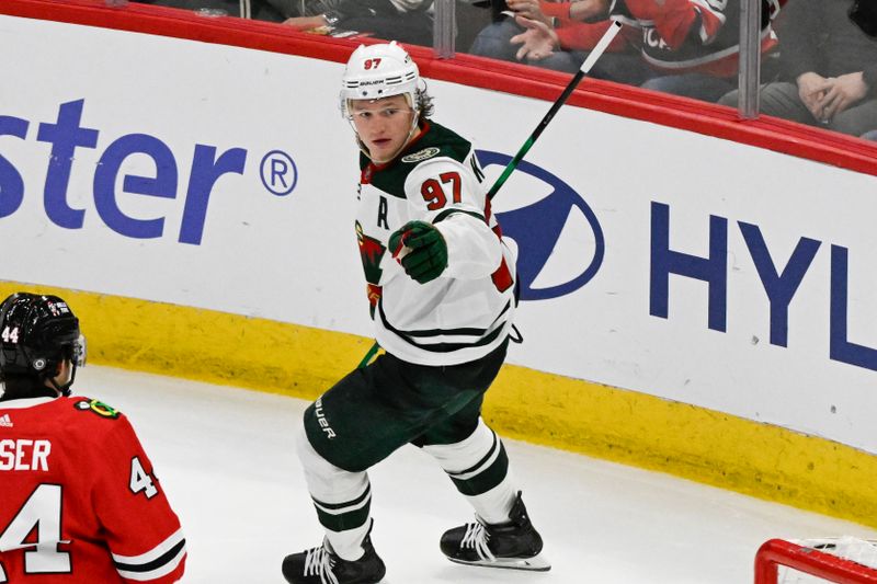 Apr 7, 2024; Chicago, Illinois, USA;  Minnesota Wild left wing Kirill Kaprizov (97) celebrates after he scored a goal against the Chicago Blackhawks during the third period at United Center. Mandatory Credit: Matt Marton-USA TODAY Sports