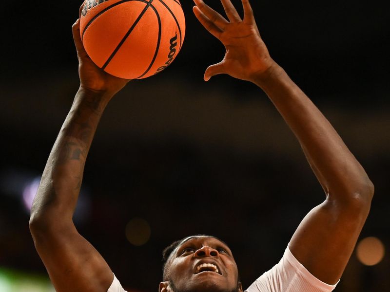 Dec 2, 2022; College Park, Maryland, USA;  Illinois Fighting Illini forward Dain Dainja (42) shoots as Maryland Terrapins forward Donta Scott (not pictured) looks on during the first half at Xfinity Center. Mandatory Credit: Tommy Gilligan-USA TODAY Sports