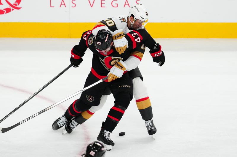 Oct 25, 2024; Las Vegas, Nevada, USA; Vegas Golden Knights center Nicolas Roy (10) wraps up Ottawa Senators defenseman Tyler Kleven (43) during the second period at T-Mobile Arena. Mandatory Credit: Stephen R. Sylvanie-Imagn Images