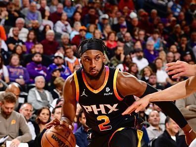 PHOENIX, AZ - DECEMBER 1: Josh Okogie #2 of the Phoenix Suns dribbles the ball during the game against the Denver Nuggets on December 1, 2023 at Footprint Center in Phoenix, Arizona. NOTE TO USER: User expressly acknowledges and agrees that, by downloading and or using this photograph, user is consenting to the terms and conditions of the Getty Images License Agreement. Mandatory Copyright Notice: Copyright 2023 NBAE (Photo by Barry Gossage/NBAE via Getty Images)