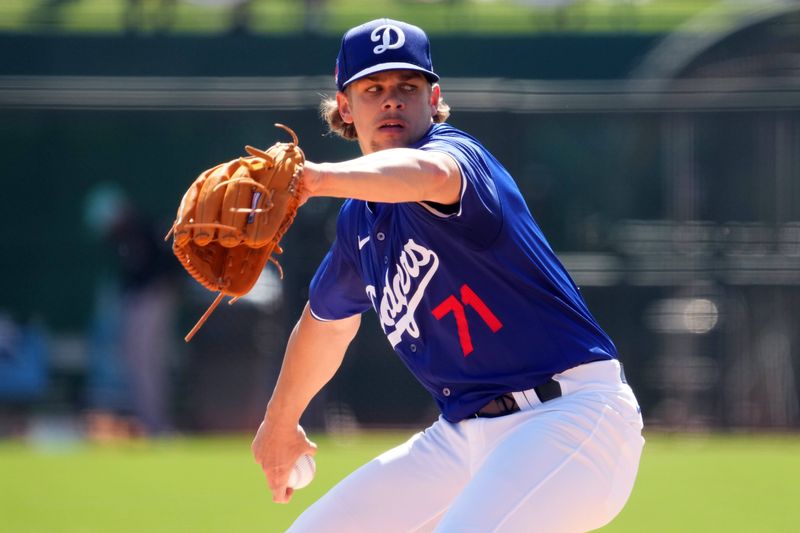 Mar 10, 2024; Phoenix, Arizona, USA; Los Angeles Dodgers starting pitcher Gavin Stone (71) pitches against the Arizona Diamondbacks during the first inning at Camelback Ranch-Glendale. Mandatory Credit: Joe Camporeale-USA TODAY Sports