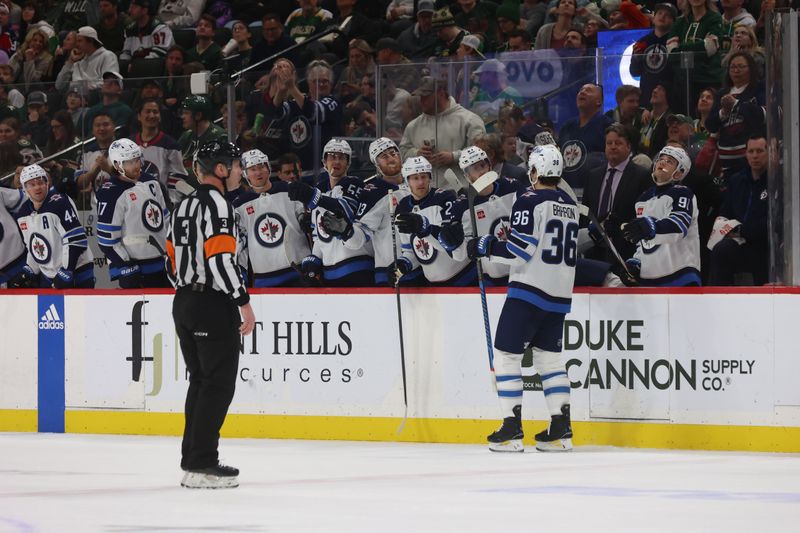 Apr 6, 2024; Saint Paul, Minnesota, USA; Winnipeg Jets center Morgan Barron (36) celebrates with teammates after scoring a goal against the Minnesota Wild during the third period at Xcel Energy Center. Winnipeg won 4-2. Mandatory Credit: Bruce Fedyck-USA TODAY Sports