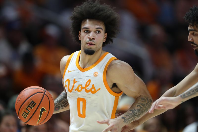 Feb 28, 2026; Knoxville, Tennessee, USA;  Tennessee Volunteers guard Ja'kobi Gillespie (0) brings the ball up court against the Alabama Crimson Tide during the first half at Thompson-Boling Arena at Food City Center. Mandatory Credit: Randy Sartin-Imagn Images