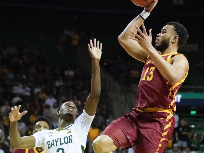 Mar 4, 2023; Waco, Texas, USA; Iowa State Cyclones guard Jaren Holmes (13) shoots over Baylor Bears guard Dale Bonner (3) during the first half at Ferrell Center. Mandatory Credit: Raymond Carlin III-USA TODAY Sports