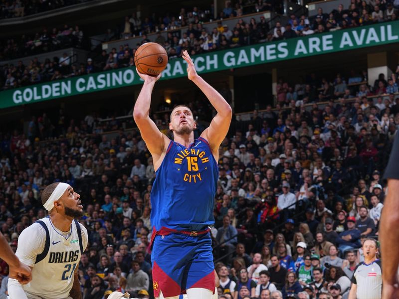 DENVER, CO - NOVEMBER 22:Nikola Jokic #15 of the Denver Nuggets shoots the ball during the game against the Dallas Mavericks during the Emirates NBA Cup game on November 22, 2024 at Ball Arena in Denver, Colorado. NOTE TO USER: User expressly acknowledges and agrees that, by downloading and/or using this Photograph, user is consenting to the terms and conditions of the Getty Images License Agreement. Mandatory Copyright Notice: Copyright 2024 NBAE (Photo by Bart Young/NBAE via Getty Images)