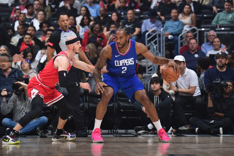 LOS ANGELES, CA - MARCH 9: Kawhi Leonard #2 of the LA Clippers dribbles the ball during the game against the Chicago Bulls on March 9, 2024 at Crypto.Com Arena in Los Angeles, California. NOTE TO USER: User expressly acknowledges and agrees that, by downloading and/or using this Photograph, user is consenting to the terms and conditions of the Getty Images License Agreement. Mandatory Copyright Notice: Copyright 2024 NBAE (Photo by Adam Pantozzi/NBAE via Getty Images)