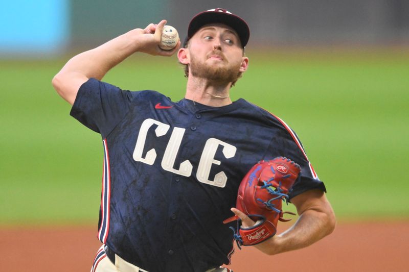 Sep 18, 2024; Cleveland, Ohio, USA; Cleveland Guardians starting pitcher Tanner Bibee (28) delivers a pitch in the first inning against the Minnesota Twins at Progressive Field. Mandatory Credit: David Richard-Imagn Images