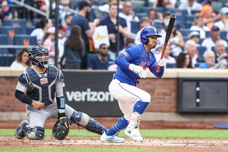 Jun 26, 2024; New York City, New York, USA;  New York Mets shortstop Francisco Lindor (12) hits a double in the first inning against the New York Yankees at Citi Field. Mandatory Credit: Wendell Cruz-USA TODAY Sports