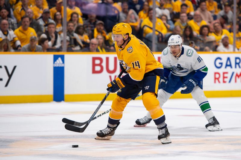 Apr 26, 2024; Nashville, Tennessee, USA; Nashville Predators center Gustav Nyquist (14) skates against the Vancouver Canucks during the third period in game three of the first round of the 2024 Stanley Cup Playoffs at Bridgestone Arena. Mandatory Credit: Steve Roberts-USA TODAY Sports