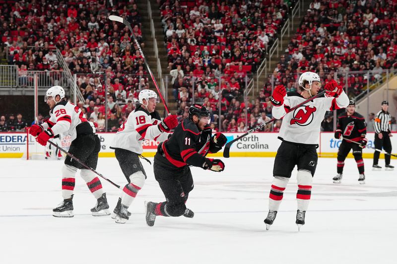New Jersey Devils' Nico Hischier Set to Challenge Carolina Hurricanes in Playoff Showdown