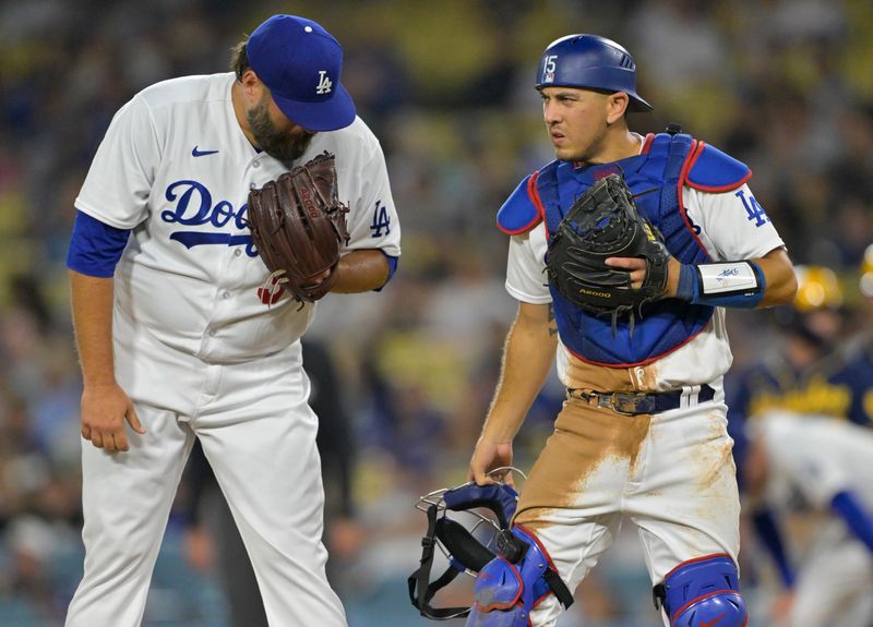 Aug 17, 2023; Los Angeles, California, USA;  Los Angeles Dodgers catcher Austin Barnes (15) talks with starting pitcher Lance Lynn (35) at the mound in the fourth inning at Dodger Stadium. Mandatory Credit: Jayne Kamin-Oncea-USA TODAY Sports