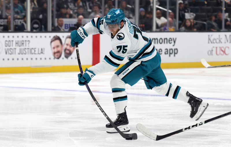 Oct 24, 2024; Los Angeles, California, USA; San Jose Sharks left wing Danil Gushchin (75) shoots during the third period against the Los Angeles Kings at Crypto.com Arena. Mandatory Credit: Jason Parkhurst-Imagn Images