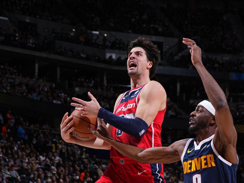 DENVER, CO - FEBRUARY 22: Deni Avdija #8 of the Washington Wizards drives to the basket during the game against the Denver Nuggets on February 22, 2024 at the Ball Arena in Denver, Colorado. NOTE TO USER: User expressly acknowledges and agrees that, by downloading and/or using this Photograph, user is consenting to the terms and conditions of the Getty Images License Agreement. Mandatory Copyright Notice: Copyright 2024 NBAE (Photo by Garrett Ellwood/NBAE via Getty Images)