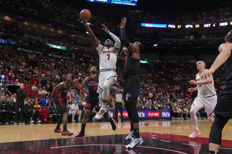 MIAMI, FL - MARCH 13: Reggie Jackson #7 of the Denver Nuggets shoots the ball during the game against the Miami Heat on March 13, 2024 at Kaseya Center in Miami, Florida. NOTE TO USER: User expressly acknowledges and agrees that, by downloading and or using this Photograph, user is consenting to the terms and conditions of the Getty Images License Agreement. Mandatory Copyright Notice: Copyright 2024 NBAE (Photo by Eric Espada/NBAE via Getty Images)