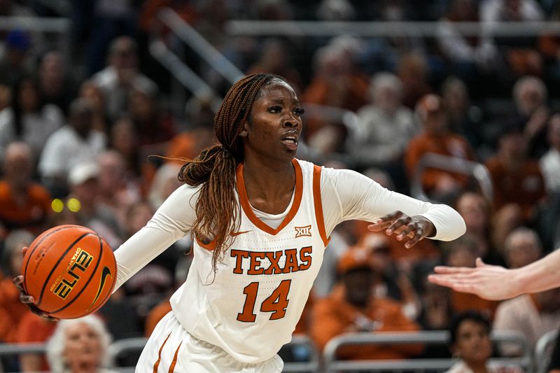 February 27, 2023; Austin, TX; Texas Longhorns forward Amina Muhammad (14) looks for an open teammate during the women   s basketball game against Baylor at the Moody Center on Monday Feb. 27, 2023 in Austin. Mandatory Credit: Aaron E. Martinez-USA TODAY NETWORK