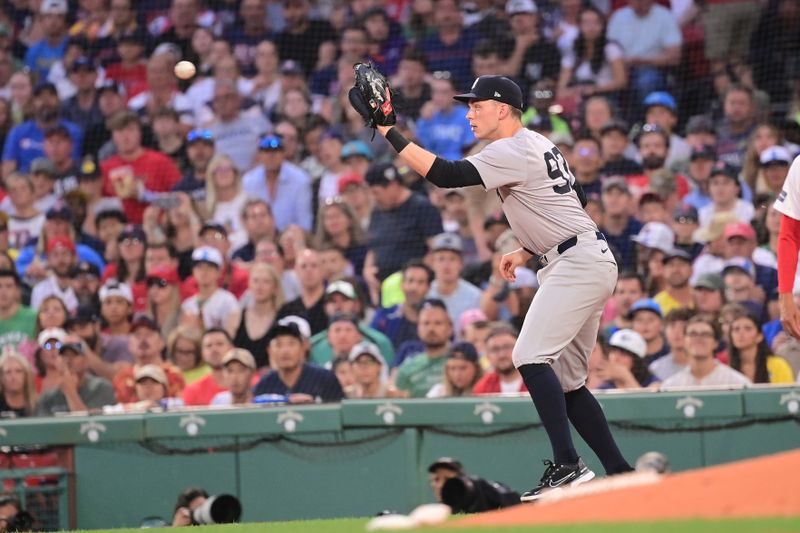 Jul 28, 2024; Boston, Massachusetts, USA; New York Yankees first baseman Ben Rice (93) makes a catch for an out against the Boston Red Sox during the second inning at Fenway Park. Mandatory Credit: Eric Canha-USA TODAY Sports