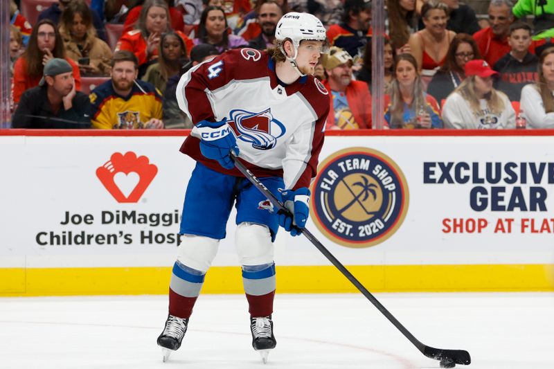 Feb 11, 2023; Sunrise, Florida, USA; Colorado Avalanche defenseman Bowen Byram (4) moves the puck during the second period against the Florida Panthers at FLA Live Arena. Mandatory Credit: Sam Navarro-USA TODAY Sports