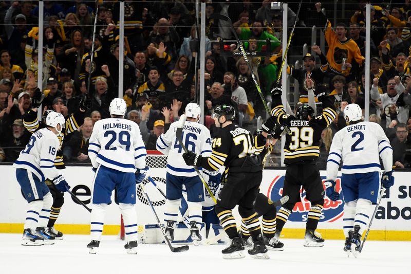 Apr 20, 2024; Boston, Massachusetts, USA; Boston Bruins left wing Jake DeBrusk (74) scores a goal during the second period in game one of the first round of the 2024 Stanley Cup Playoffs against the Toronto Maple Leafs at TD Garden. Mandatory Credit: Bob DeChiara-USA TODAY Sports