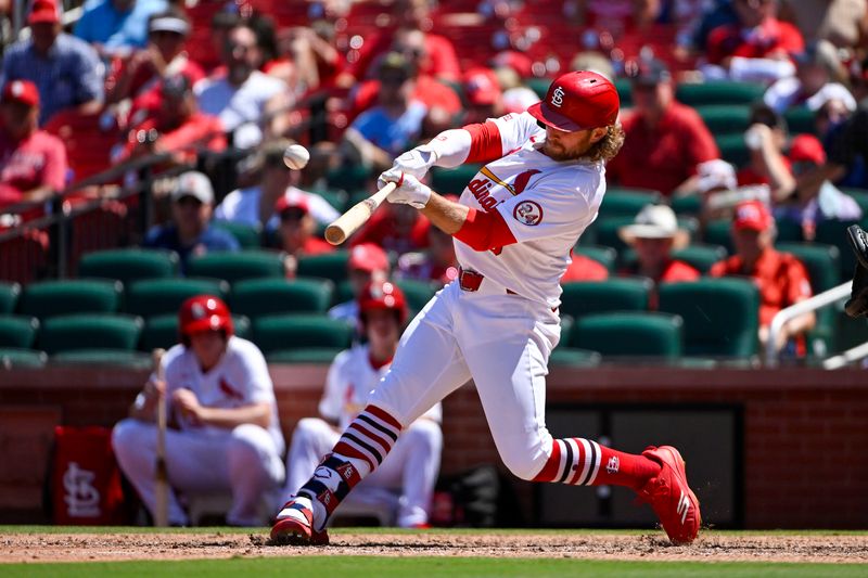 Jun 13, 2024; St. Louis, Missouri, USA;  St. Louis Cardinals left fielder Brendan Donovan (33) hits a solo home run against the Pittsburgh Pirates during the sixth inning at Busch Stadium. Mandatory Credit: Jeff Curry-USA TODAY Sports