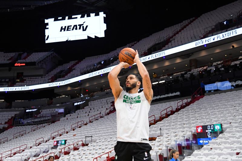 MIAMI, FL - APRIL 27: Jayson Tatum #0 of the Boston Celtics warms up before the game against the Miami Heat during Round 1 Game 3 of the 2024 NBA Playoffs on April 27, 2024 at Kaseya Center in Miami, Florida. NOTE TO USER: User expressly acknowledges and agrees that, by downloading and or using this Photograph, user is consenting to the terms and conditions of the Getty Images License Agreement. Mandatory Copyright Notice: Copyright 2024 NBAE (Photo by Brian Babineau/NBAE via Getty Images)