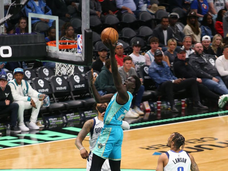 CHARLOTTE, NC - APRIL 9: JT Thor #21 of the Charlotte Hornets shoots the ball during the game against the Dallas Mavericks on April 9, 2024 at Spectrum Center in Charlotte, North Carolina. NOTE TO USER: User expressly acknowledges and agrees that, by downloading and or using this photograph, User is consenting to the terms and conditions of the Getty Images License Agreement. Mandatory Copyright Notice: Copyright 2024 NBAE (Photo by Kent Smith/NBAE via Getty Images)