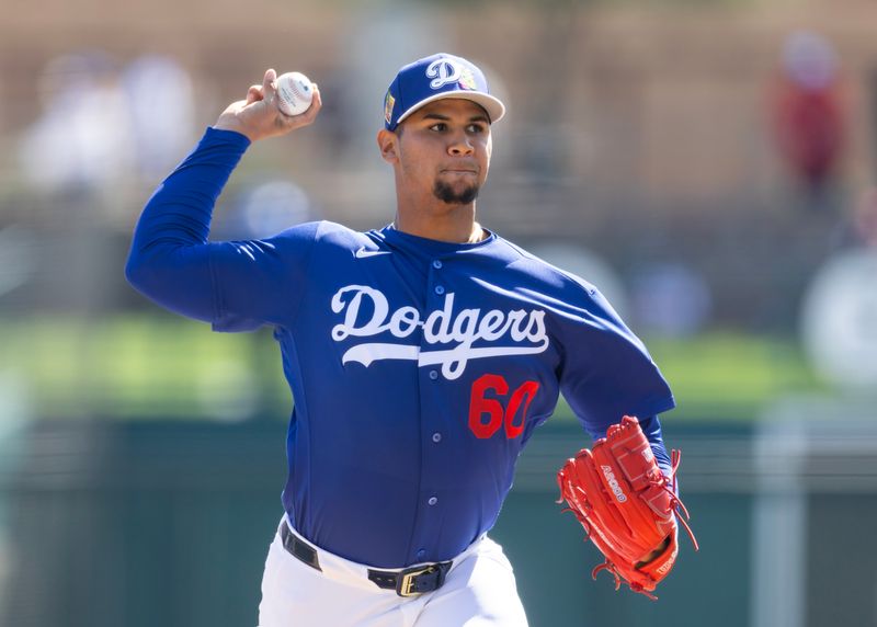 Feb 24, 2026; Phoenix, Arizona, USA; Los Angeles Dodgers pitcher Edgardo Henriquez against the Cleveland Guardians during a spring training game at Camelback Ranch-Glendale. Mandatory Credit: Mark J. Rebilas-Imagn Images