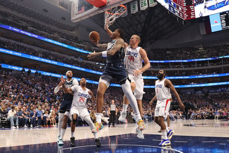 DALLAS, TX - APRIL 28: PJ Washington #25 of the Dallas Mavericks shoots the ball during the game against the LA Clippers during Round 1 Game 4 of the 2024 NBA Playoffs on April 28, 2024 at the American Airlines Center in Dallas, Texas. NOTE TO USER: User expressly acknowledges and agrees that, by downloading and or using this photograph, User is consenting to the terms and conditions of the Getty Images License Agreement. Mandatory Copyright Notice: Copyright 2024 NBAE (Photo by Tim Heitman/NBAE via Getty Images)