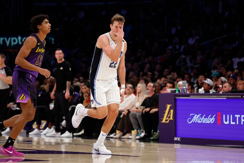 LOS ANGELES, CALIFORNIA - NOVEMBER 21:  Franz Wagner #22 of the Orlando Magic celebrates a three-point shot against the Los Angeles Lakers in the second half at Crypto.com Arena on November 21, 2024 in Los Angeles, California.  NOTE TO USER: User expressly acknowledges and agrees that, by downloading and/or using this photograph, user is consenting to the terms and conditions of the Getty Images License Agreement. (Photo by Ronald Martinez/Getty Images)