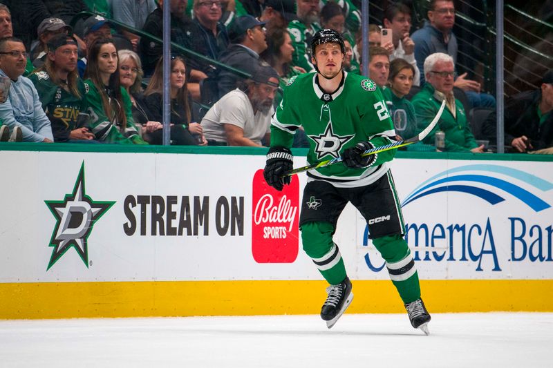 Oct 26, 2023; Dallas, Texas, USA; Dallas Stars center Roope Hintz (24) looks for the puck during the third period against the Toronto Maple Leafs at the American Airlines Center. Mandatory Credit: Jerome Miron-USA TODAY Sports