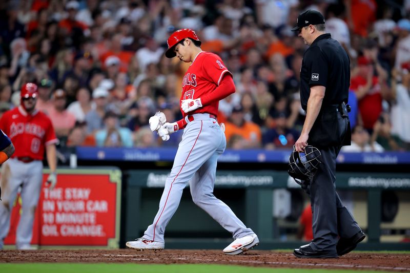 Aug 13, 2023; Houston, Texas, USA; Los Angeles Angels designated hitter Shohei Ohtani (17) crosses home plate after hitting a home run to center field against the Houston Astros during the sixth inning at Minute Maid Park. Mandatory Credit: Erik Williams-USA TODAY Sports