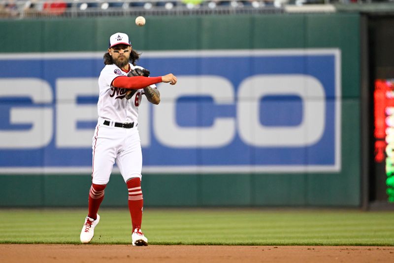 Apr 4, 2023; Washington, District of Columbia, USA; Washington Nationals second baseman Michael Chavis (6) throws out /Tampa Bay Rays designated hitter Josh Lowe (not shown) to end the first inning at Nationals Park. Mandatory Credit: Brad Mills-USA TODAY Sports