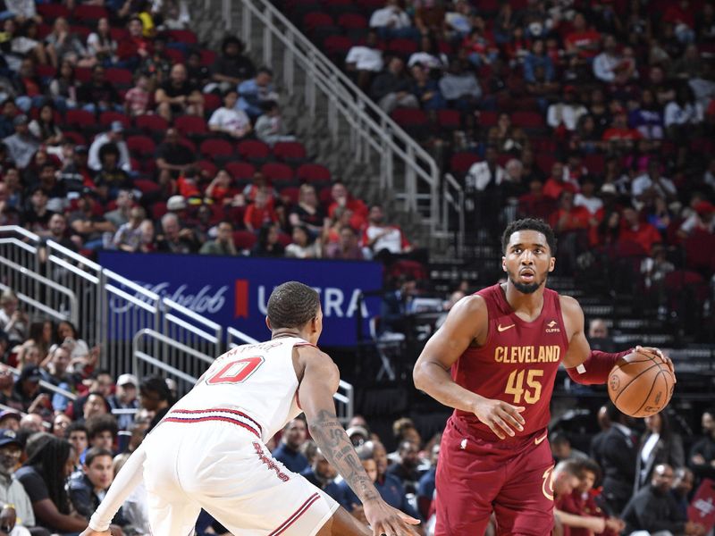 HOUSTON, TX - MARCH 16:  Donovan Mitchell #45 of the Cleveland Cavaliers dribbles the ball during the game against the Houston Rockets on March 16, 2023 at the Toyota Center in Houston, Texas. NOTE TO USER: User expressly acknowledges and agrees that, by downloading and or using this photograph, User is consenting to the terms and conditions of the Getty Images License Agreement. Mandatory Copyright Notice: Copyright 2024 NBAE (Photo by Logan Riely/NBAE via Getty Images)