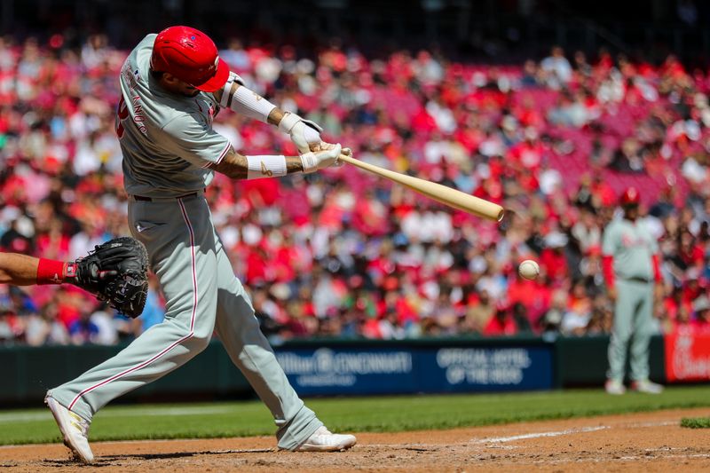 Apr 25, 2024; Cincinnati, Ohio, USA; Philadelphia Phillies outfielder Nick Castellanos (8) hits a single against the Cincinnati Reds in the eighth inning at Great American Ball Park. Mandatory Credit: Katie Stratman-USA TODAY Sports