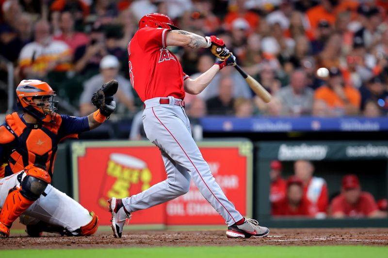 Aug 13, 2023; Houston, Texas, USA; Los Angeles Angels center fielder Mickey Moniak (16) hits a RBI double to right field against the Houston Astros during the third inning at Minute Maid Park. Mandatory Credit: Erik Williams-USA TODAY Sports