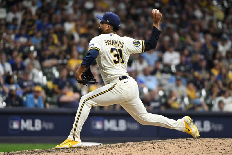 Oct 3, 2023; Milwaukee, Wisconsin, USA; Milwaukee Brewers relief pitcher Joel Payamps (31) pitches in the seventh inning against the Arizona Diamondbacks during game one of the Wildcard series for the 2023 MLB playoffs at American Family Field. Mandatory Credit: Michael McLoone-USA TODAY Sports