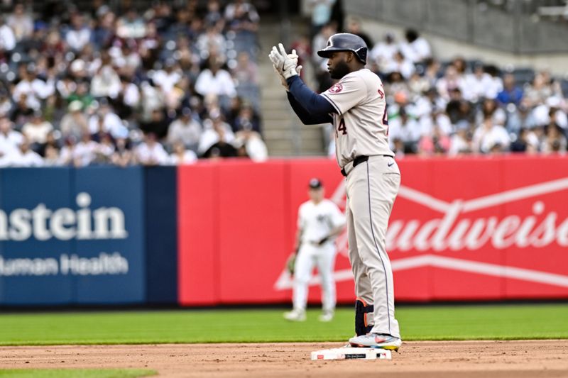 May 9, 2024; Bronx, New York, USA; Houston Astros outfielder Yordan Alvarez (44) reacts after hitting a double against the New York Yankees during the fifth inning at Yankee Stadium. Mandatory Credit: John Jones-USA TODAY Sports