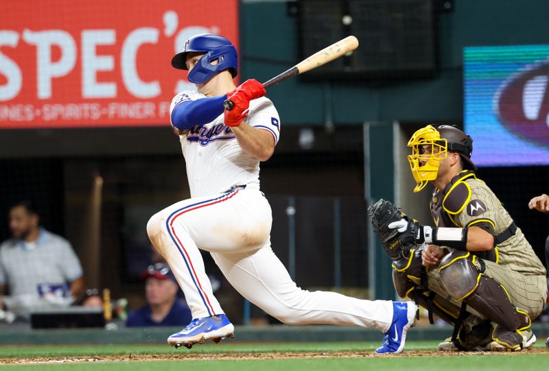 Jul 2, 2024; Arlington, Texas, USA;  Texas Rangers left fielder Wyatt Langford (36) hits a double during the fifth inning against the San Diego Padres at Globe Life Field. Mandatory Credit: Kevin Jairaj-USA TODAY Sports