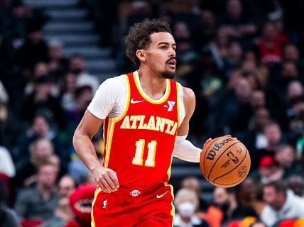 TORONTO, ON - DECEMBER 15: Trae Young #11 of the Atlanta Hawks dribbles against the Toronto Raptors during the first half of their basketball game at the Scotiabank Arena on December 15, 2023 in Toronto, Ontario, Canada. NOTE TO USER: User expressly acknowledges and agrees that, by downloading and/or using this Photograph, user is consenting to the terms and conditions of the Getty Images License Agreement. (Photo by Mark Blinch/Getty Images)