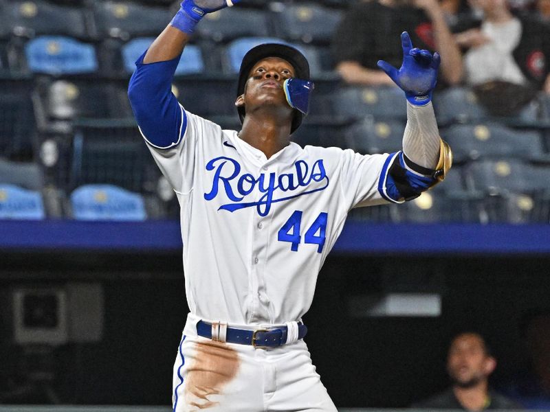 Jun 14, 2023; Kansas City, Missouri, USA;  Kansas City Royals center fielder Dairon Blanco (44) reacts after hitting a triple in the eighth inning against the Cincinnati Reds at Kauffman Stadium. Mandatory Credit: Peter Aiken-USA TODAY Sports