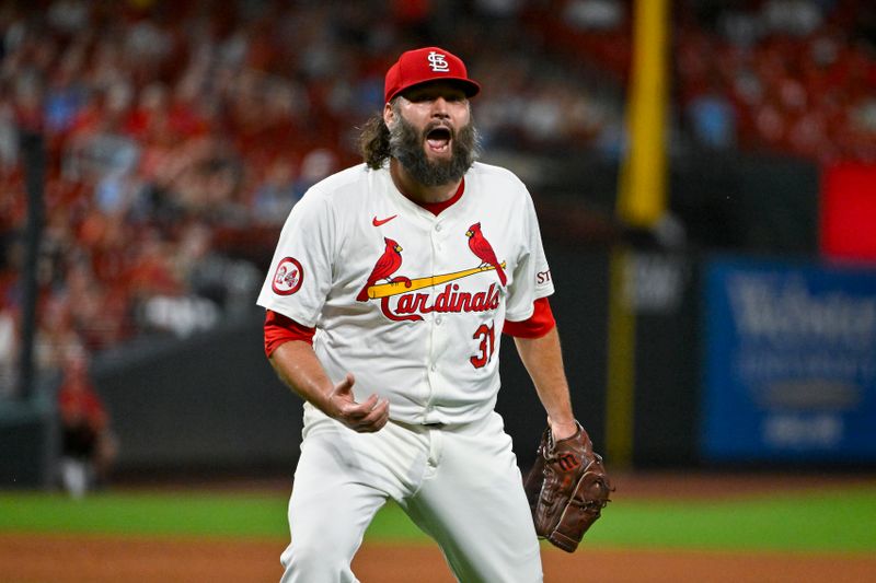 Sep 17, 2024; St. Louis, Missouri, USA;  St. Louis Cardinals starting pitcher Lance Lynn (31) reacts after inning ending double play against the Pittsburgh Pirates during the fifth inning at Busch Stadium. Mandatory Credit: Jeff Curry-Imagn Images