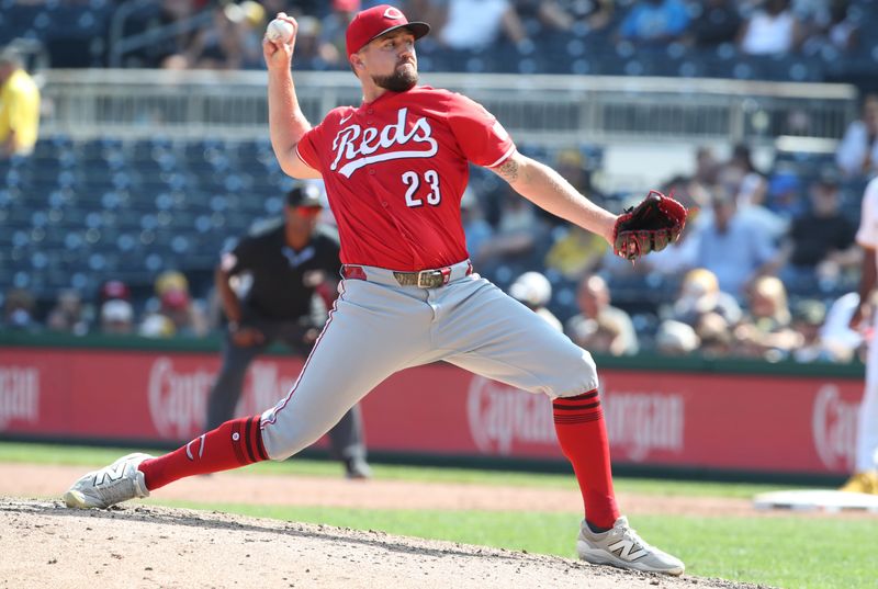 Aug 10, 2025; Pittsburgh, Pennsylvania, USA;  Cincinnati Reds relief pitcher Graham Ashcraft (23) pitches against the Pittsburgh Pirates during the seventh inning at PNC Park. Mandatory Credit: Charles LeClaire-Imagn Images