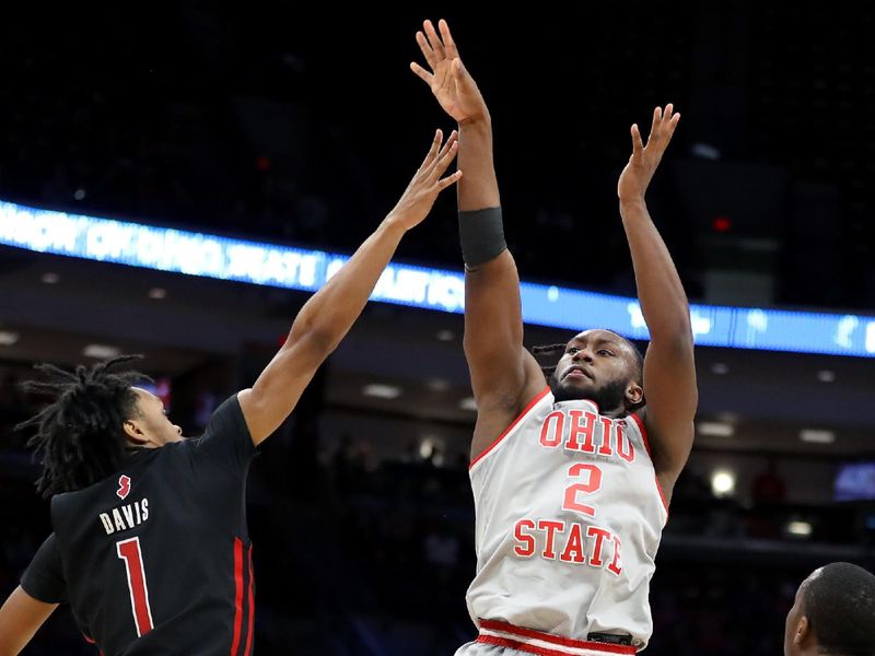 Jan 3, 2024; Columbus, Ohio, USA; Ohio State Buckeyes guard Bruce Thornton (2) shoots the ball as Rutgers Scarlet Knights guard Jamichael Davis (1) defends during the second half at Value City Arena. Mandatory Credit: Joseph Maiorana-USA TODAY Sports
