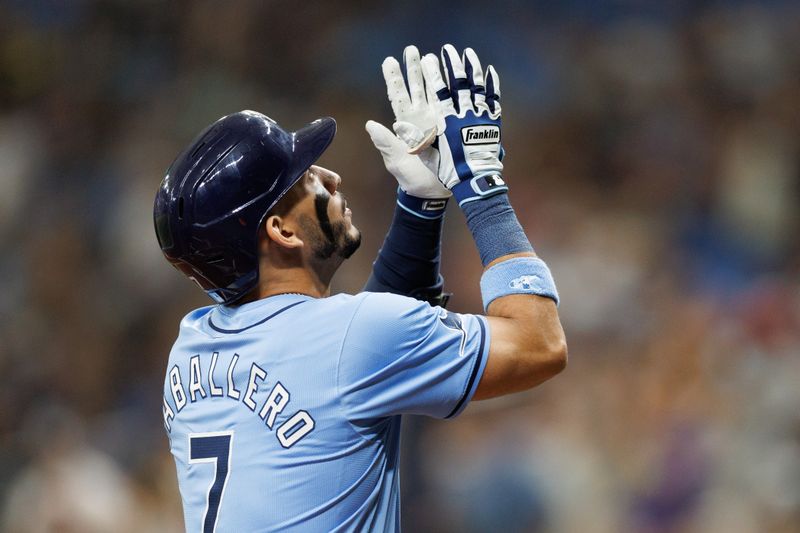 Jun 30, 2024; St. Petersburg, Florida, USA;  Tampa Bay Rays shortstop Jose Caballero (7) runs the bases after hitting a two-run home run against the Washington Nationals in the second inning at Tropicana Field. Mandatory Credit: Nathan Ray Seebeck-USA TODAY Sports