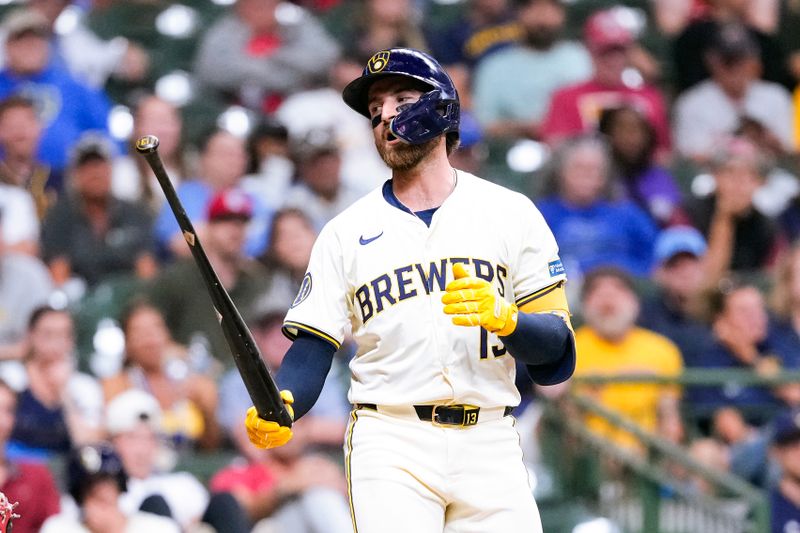 Sep 4, 2024; Milwaukee, Wisconsin, USA;  Milwaukee Brewers catcher Eric Haase (13) reacts after striking out during the fifth inning against the St. Louis Cardinals at American Family Field. Mandatory Credit: Jeff Hanisch-Imagn Images