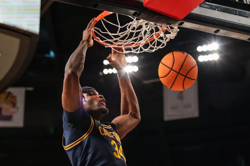 Mar 4, 2026; Atlanta, Georgia, USA; California Golden Bears forward Lee Dort (34) dunks the ball against the Georgia Tech Yellow Jackets during the first half at McCamish Pavilion. Mandatory Credit: Jordan Godfree-Imagn Images