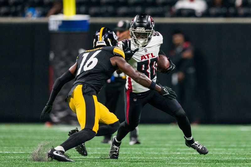 Atlanta Falcons wide receiver Josh Ali (80) runs the ball as Pittsburgh Steelers safety Jalen Elliott (16) defends during the second half of an NFL preseason football game, Thursday, Aug. 24, 2023, in Atlanta. The Pittsburgh Steelers won 24-0. (AP Photo/Danny Karnik)