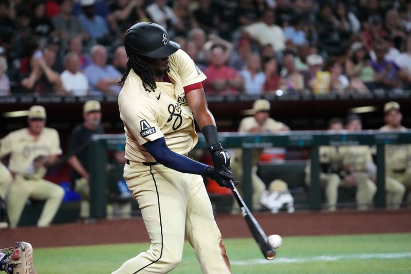 Aug 13, 2024; Phoenix, Arizona, USA; Arizona Diamondbacks first base Josh Bell (36) hits an RBI double against the Colorado Rockies during the third inning at Chase Field. Mandatory Credit: Joe Camporeale-USA TODAY Sports