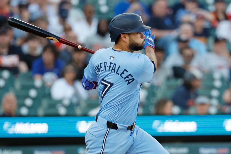 May 23, 2024; Detroit, Michigan, USA;  Toronto Blue Jays third baseman Isiah Kiner-Falefa (7) hits a triple in the fifth inning against the Detroit Tigers at Comerica Park. Mandatory Credit: Rick Osentoski-USA TODAY Sports