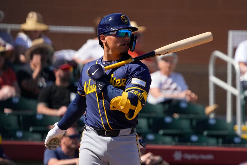 Mar 5, 2024; Scottsdale, Arizona, USA; Milwaukee Brewers catcher Willie Contreras (24) gets ready for a pitch against the San Francisco Giants in the second inning at Scottsdale Stadium. Mandatory Credit: Rick Scuteri-USA TODAY Sports