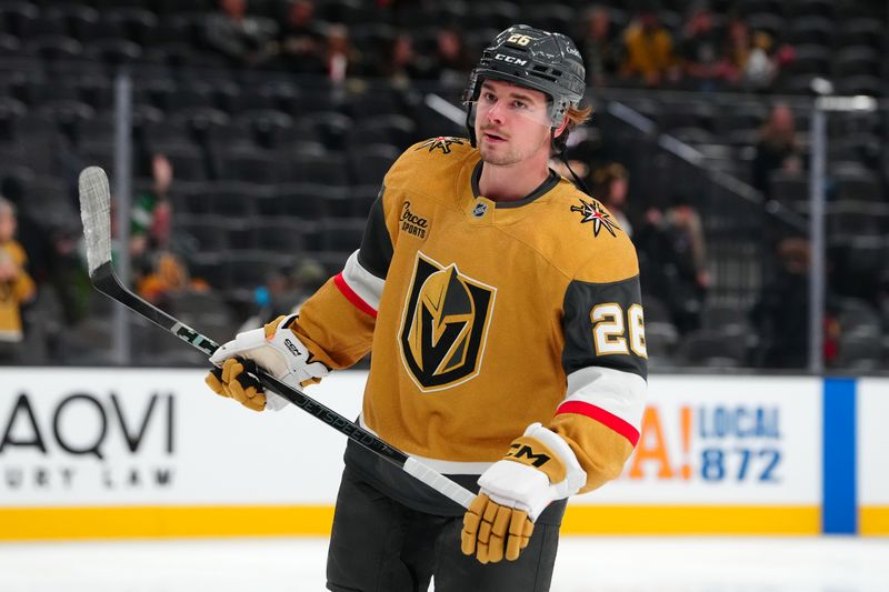 Dec 6, 2024; Las Vegas, Nevada, USA;Vegas Golden Knights right wing Alexander Holtz (26) warms up before a game against the Dallas Stars at T-Mobile Arena. Mandatory Credit: Stephen R. Sylvanie-Imagn Images